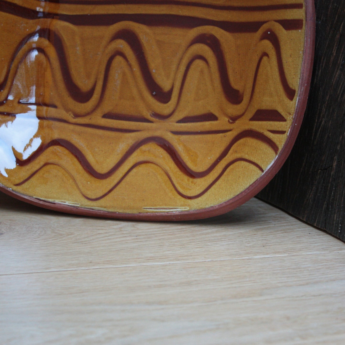 
                  
                    studio pottery slipware plate
                  
                