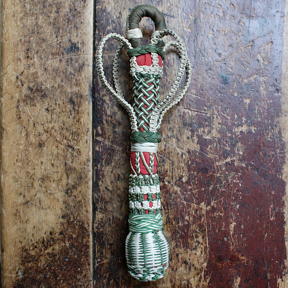 
                  
                    a ceremonial sailor made bell rope.
                  
                