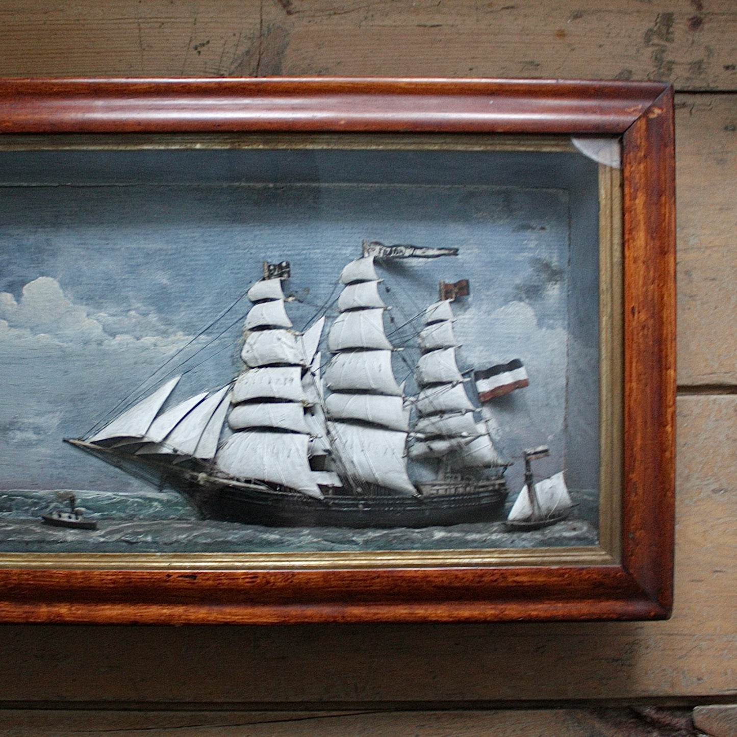 
                  
                    " freda " an antique folk art sailor made diorama .
                  
                