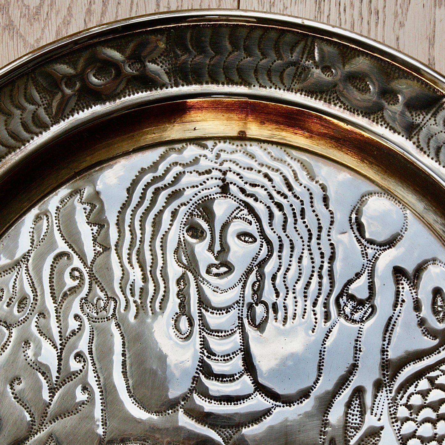 
                  
                    an african efic charger depicting mami wata.
                  
                