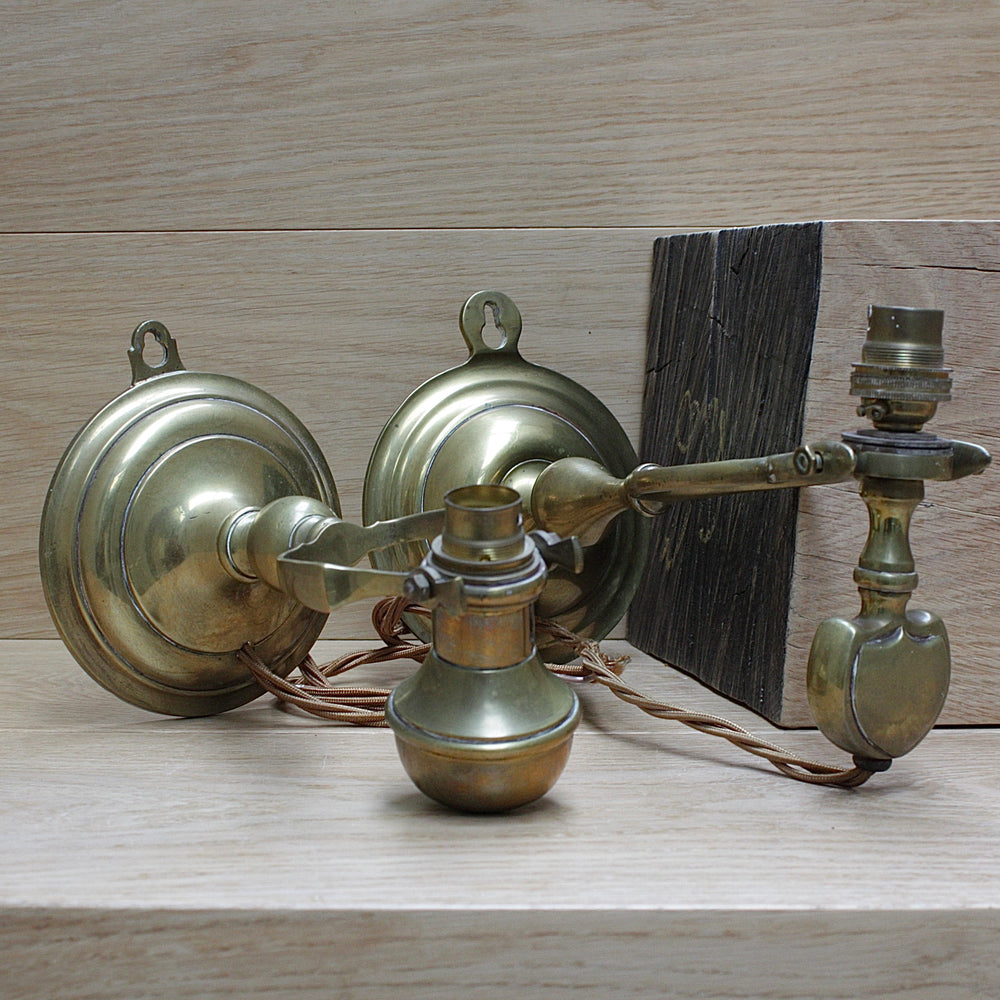 an unmatched pair of antique combination brass ship, yacht, boat saloon lamps