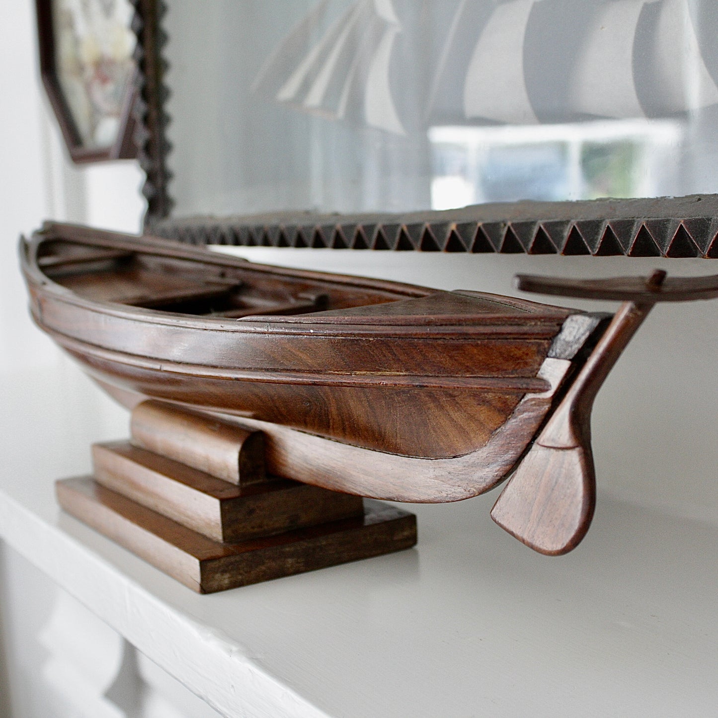
                  
                    a 19th century sailor made carved whaler.
                  
                