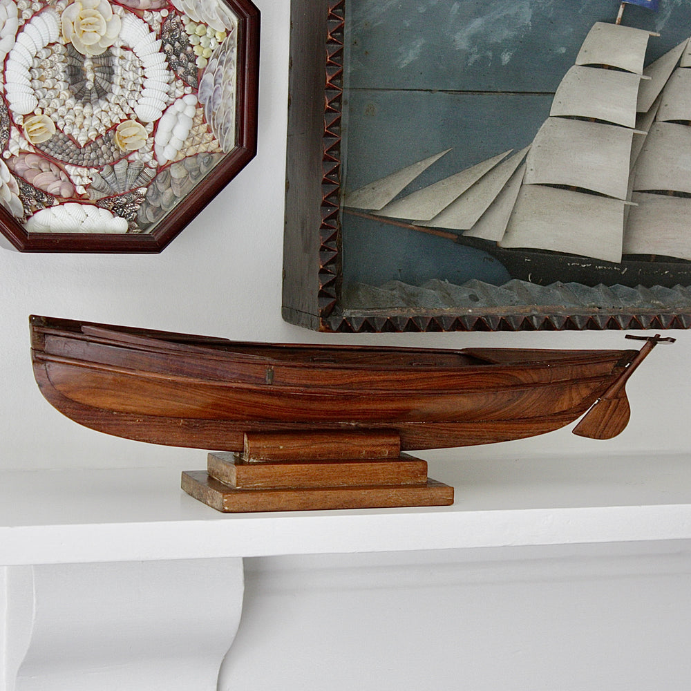 
                  
                    a 19th century sailor made carved whaler.
                  
                