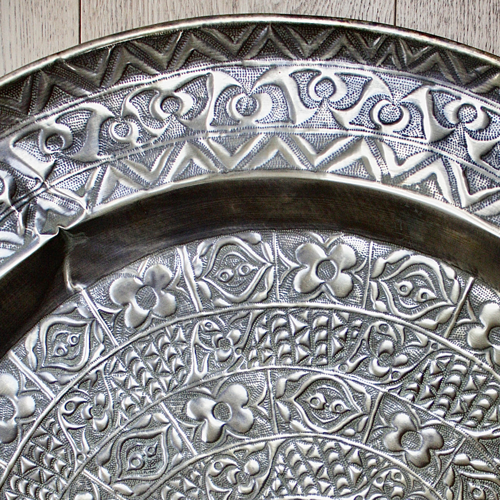 
                  
                    a magnificent huge decorated brass efic brass charger
                  
                