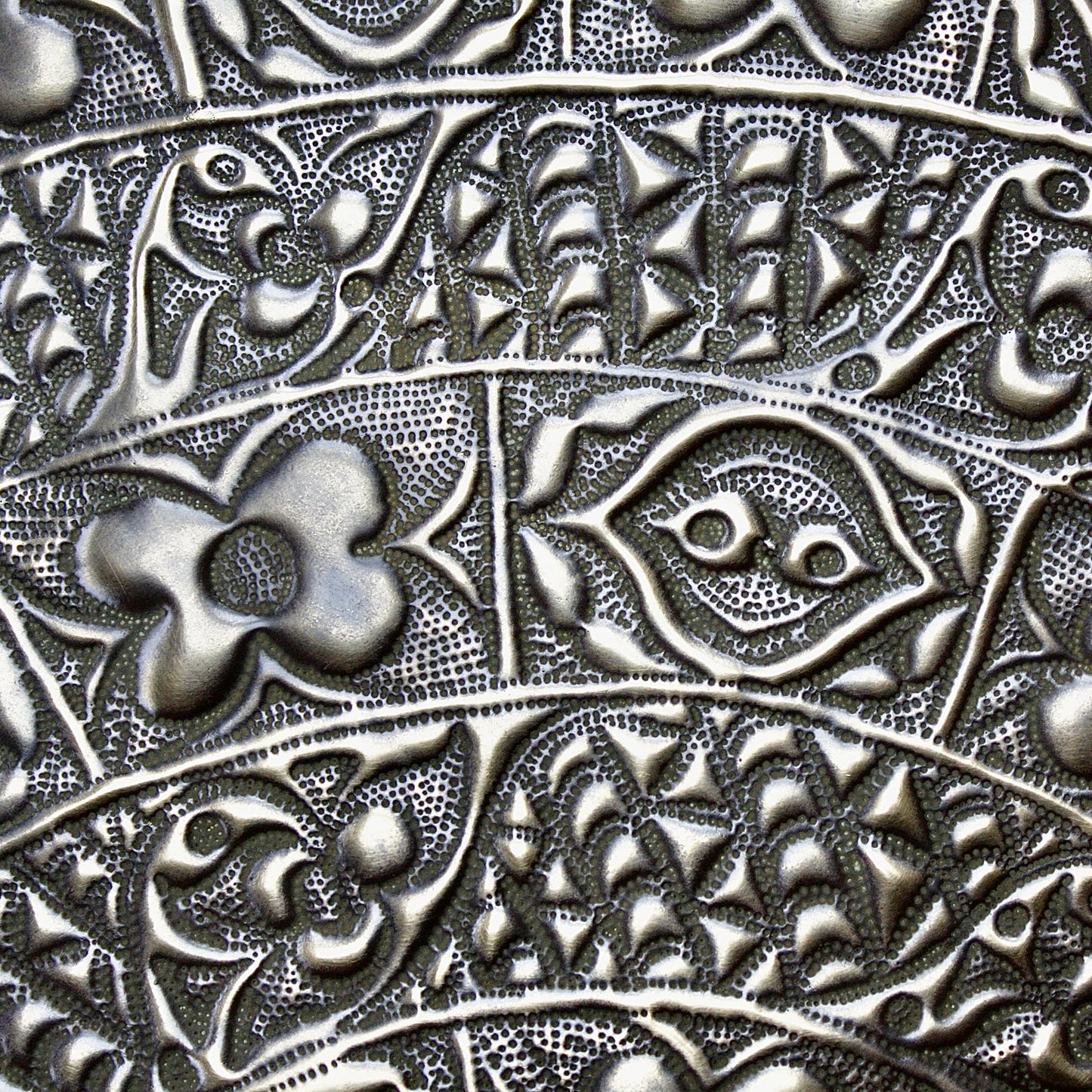 
                  
                    a magnificent huge decorated brass efic brass charger
                  
                