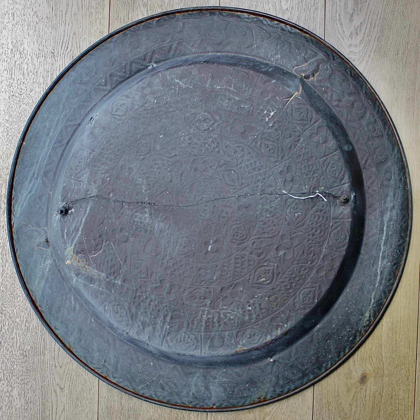 
                  
                    a magnificent huge decorated brass efic brass charger
                  
                