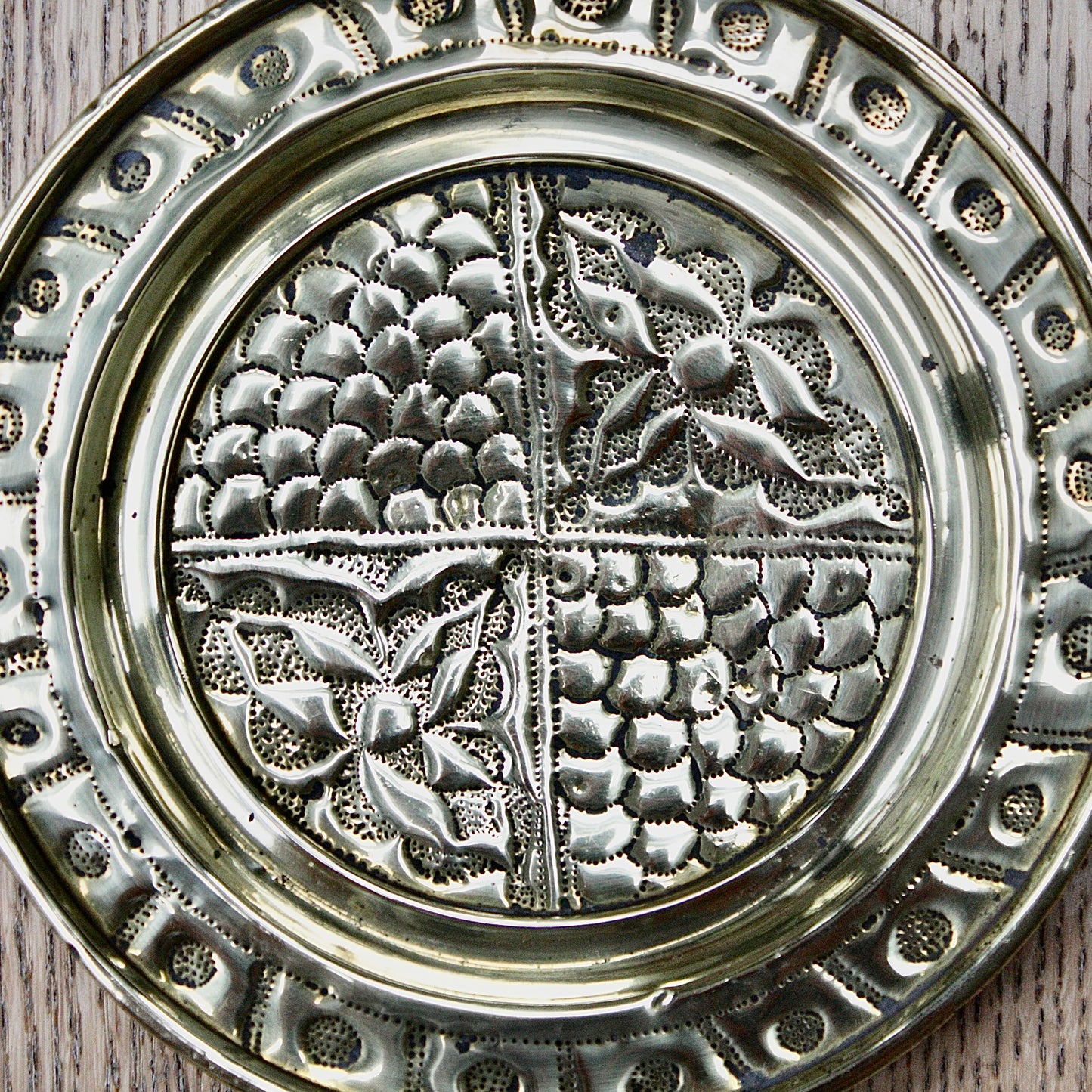 
                  
                    a pair of small embossed brass dishes from old calabar.
                  
                