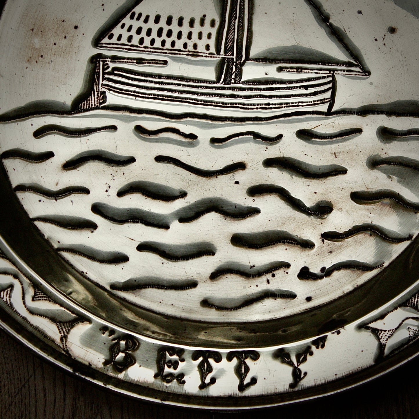 
                  
                    a commissioned brass charger from old calabar of the "betty"
                  
                