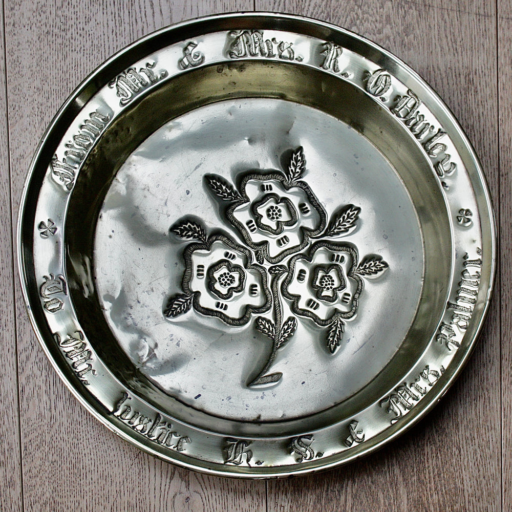 a dedicated charger from old calabar with a 3 flowers.