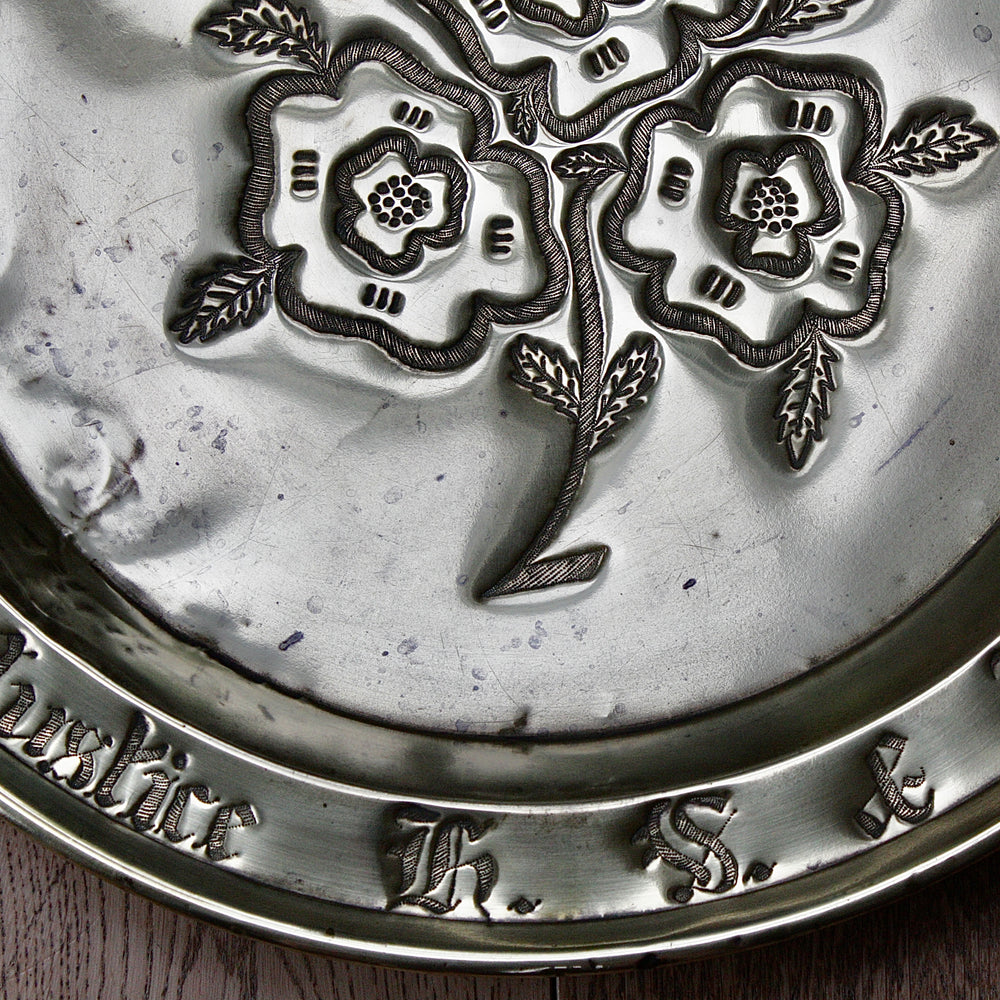 
                  
                    a dedicated charger from old calabar with a 3 flowers.
                  
                