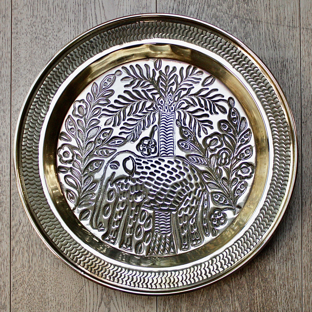 a magnificent african efic brass charger with elephant