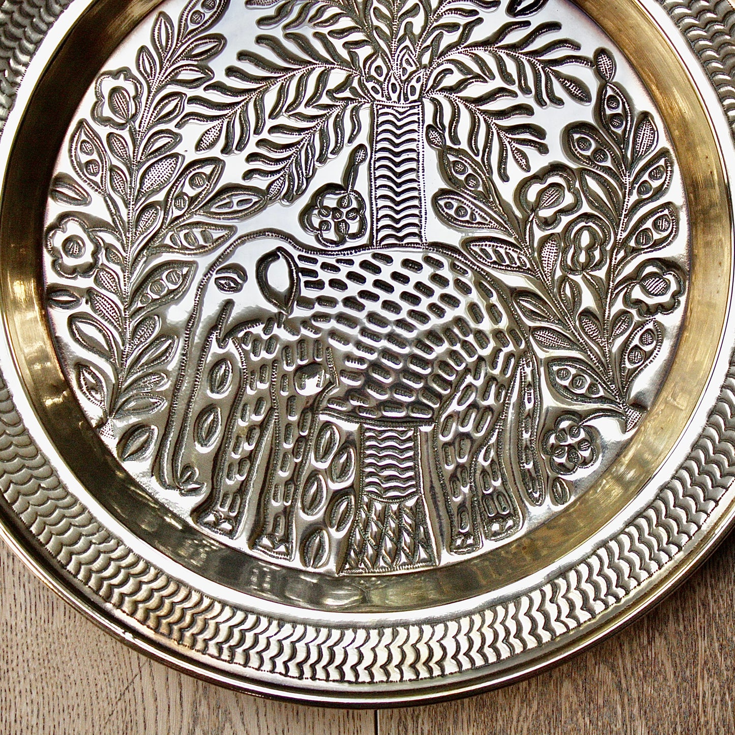 
                  
                    a magnificent african efic brass charger with elephant
                  
                