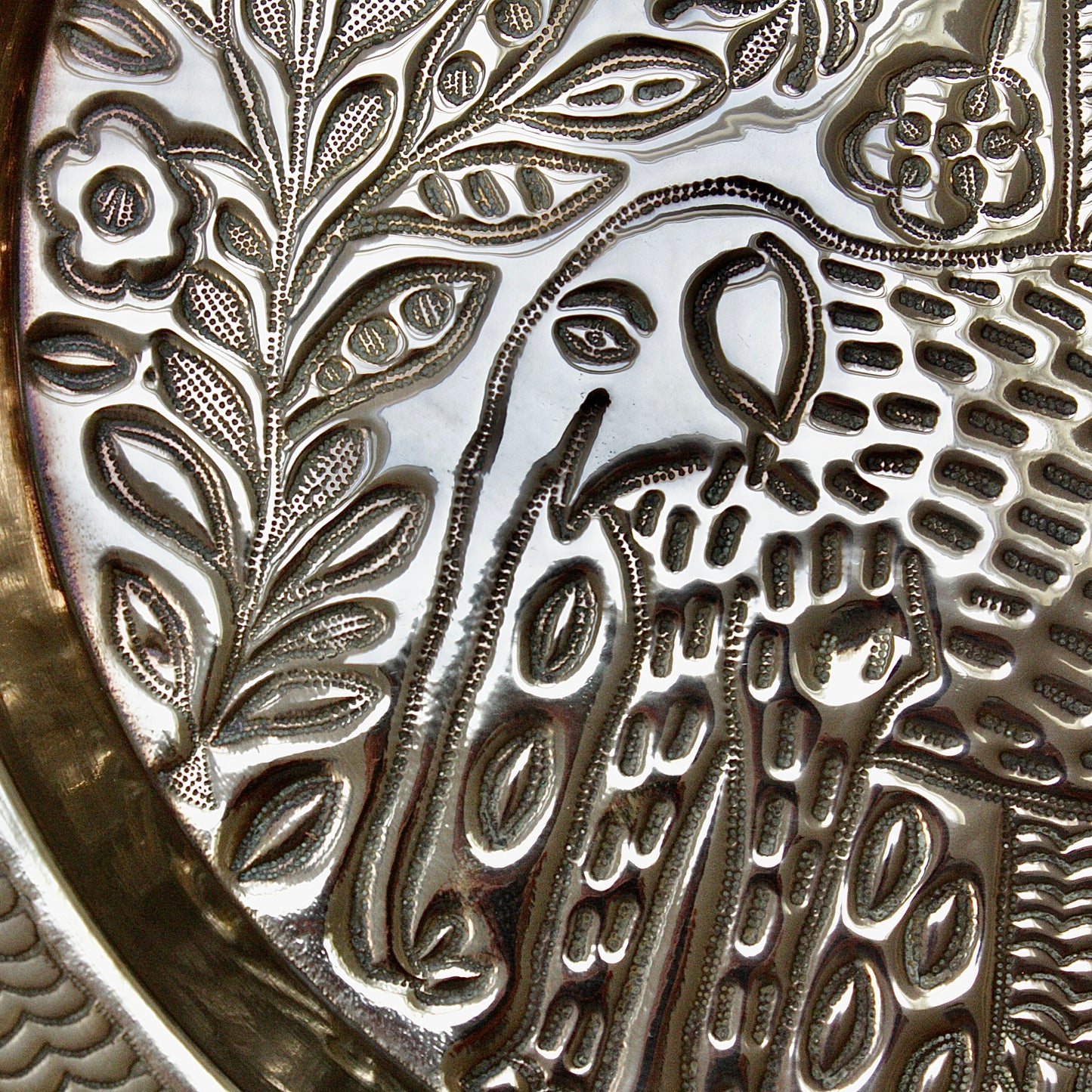 
                  
                    a magnificent african efic brass charger with elephant
                  
                