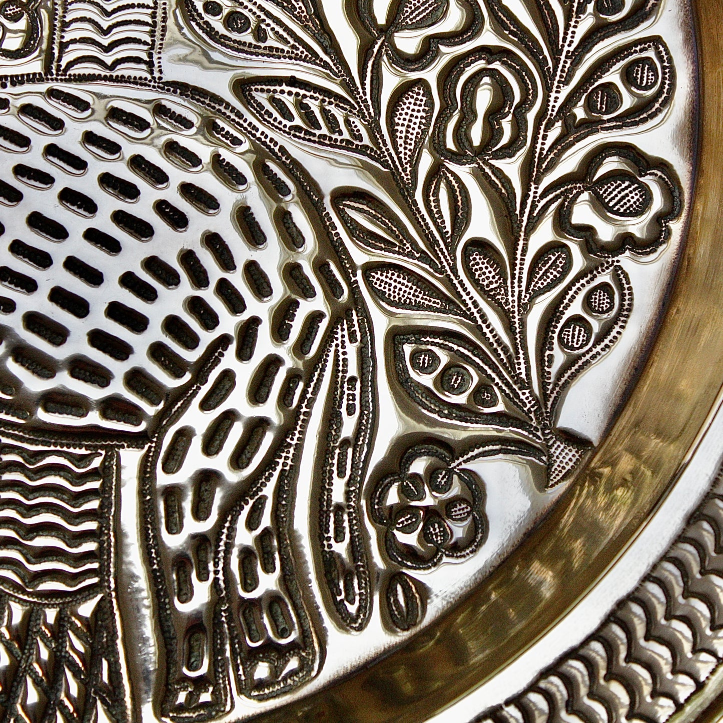 
                  
                    a magnificent african efic brass charger with elephant
                  
                