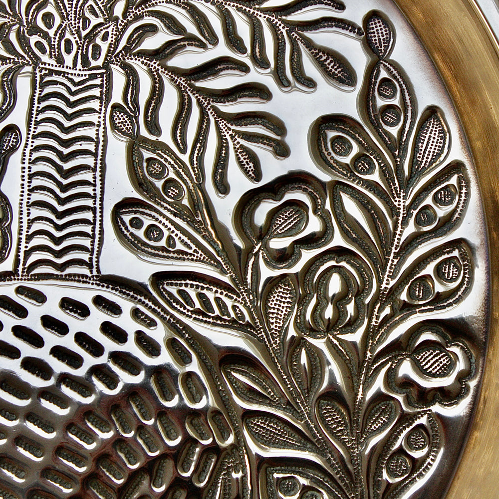 
                  
                    a magnificent african efic brass charger with elephant
                  
                