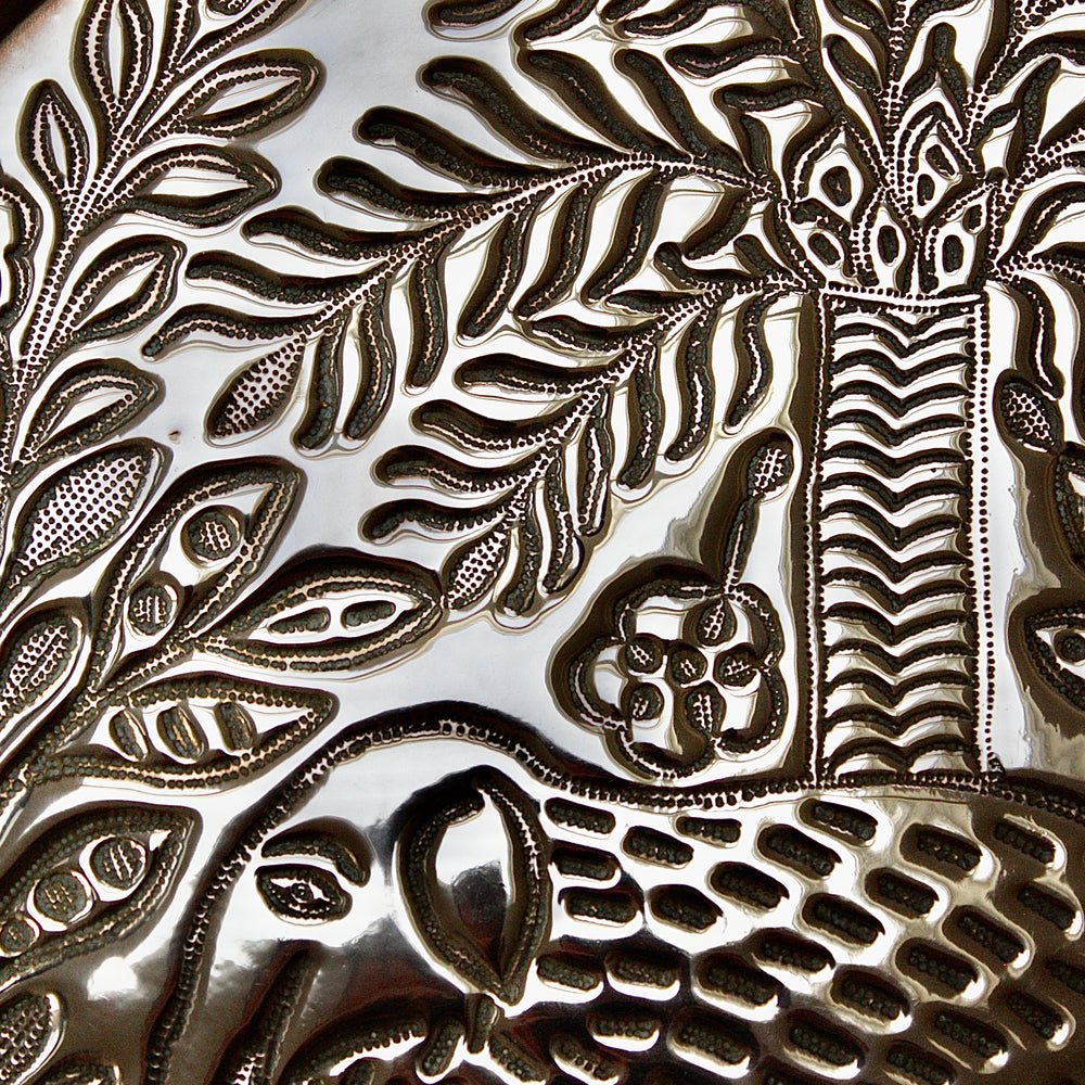 
                  
                    a magnificent african efic brass charger with elephant
                  
                