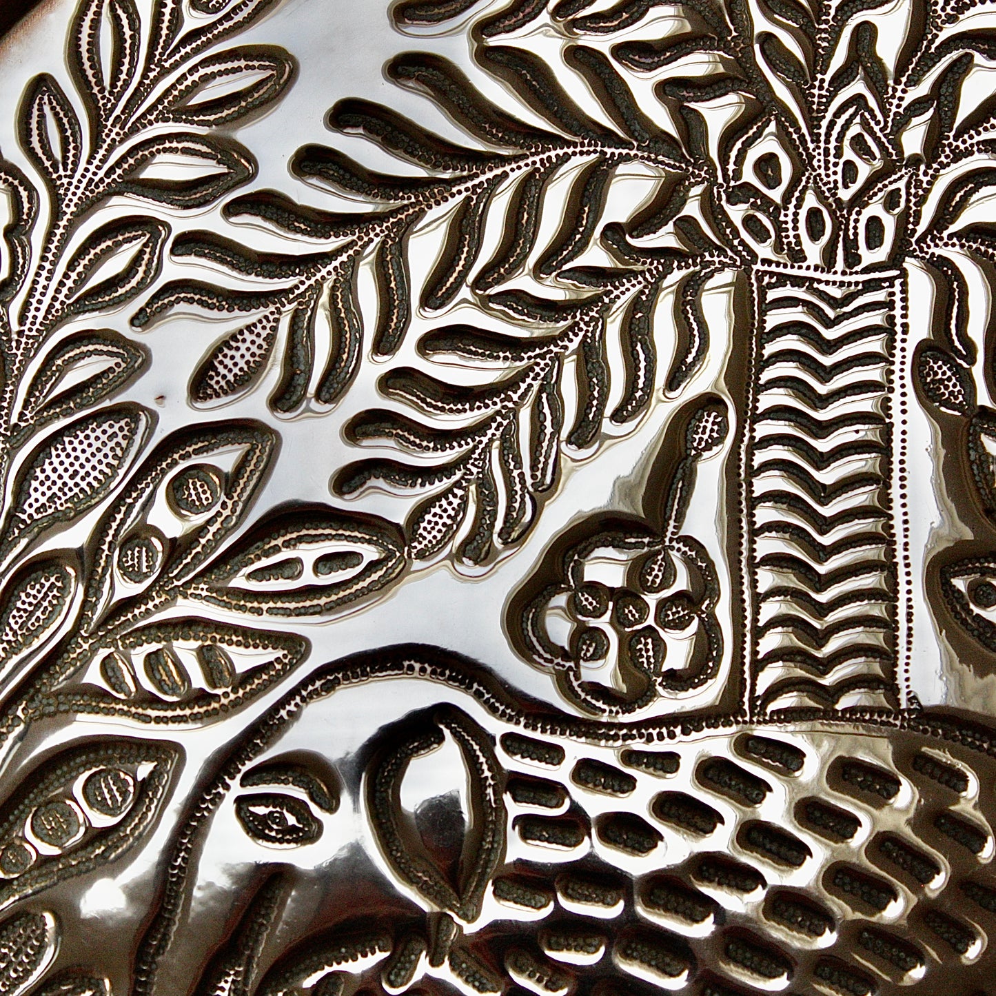 
                  
                    a magnificent african efic brass charger with elephant
                  
                