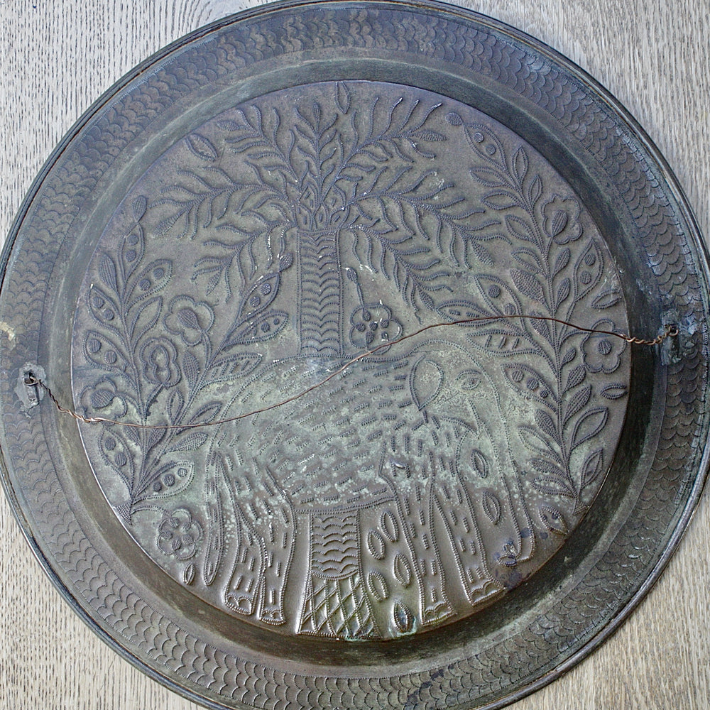 
                  
                    a magnificent african efic brass charger with elephant
                  
                