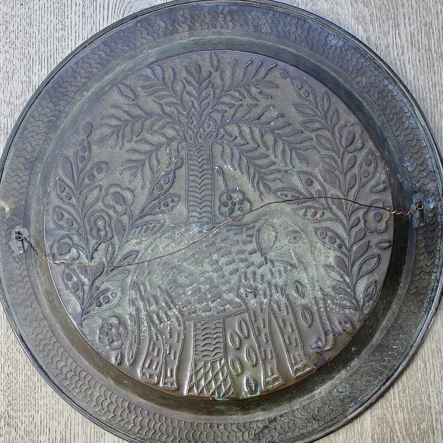 
                  
                    a magnificent african efic brass charger with elephant
                  
                