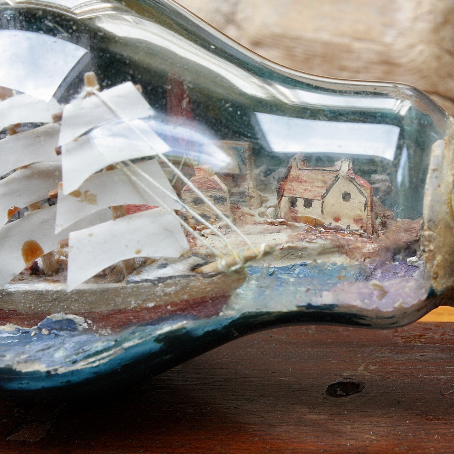 
                  
                    An unusual Folk art ship in a lightbulb.
                  
                