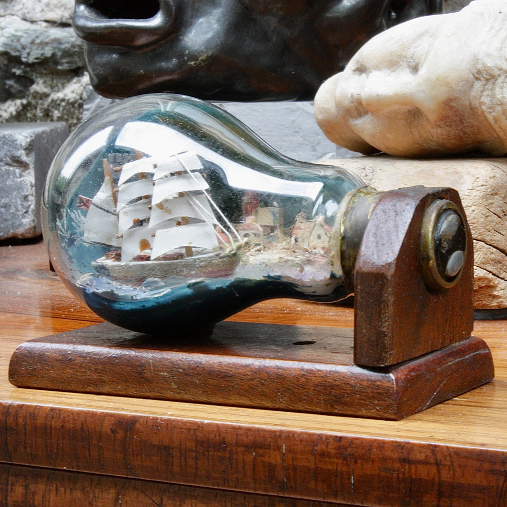 
                  
                    An unusual Folk art ship in a lightbulb.
                  
                