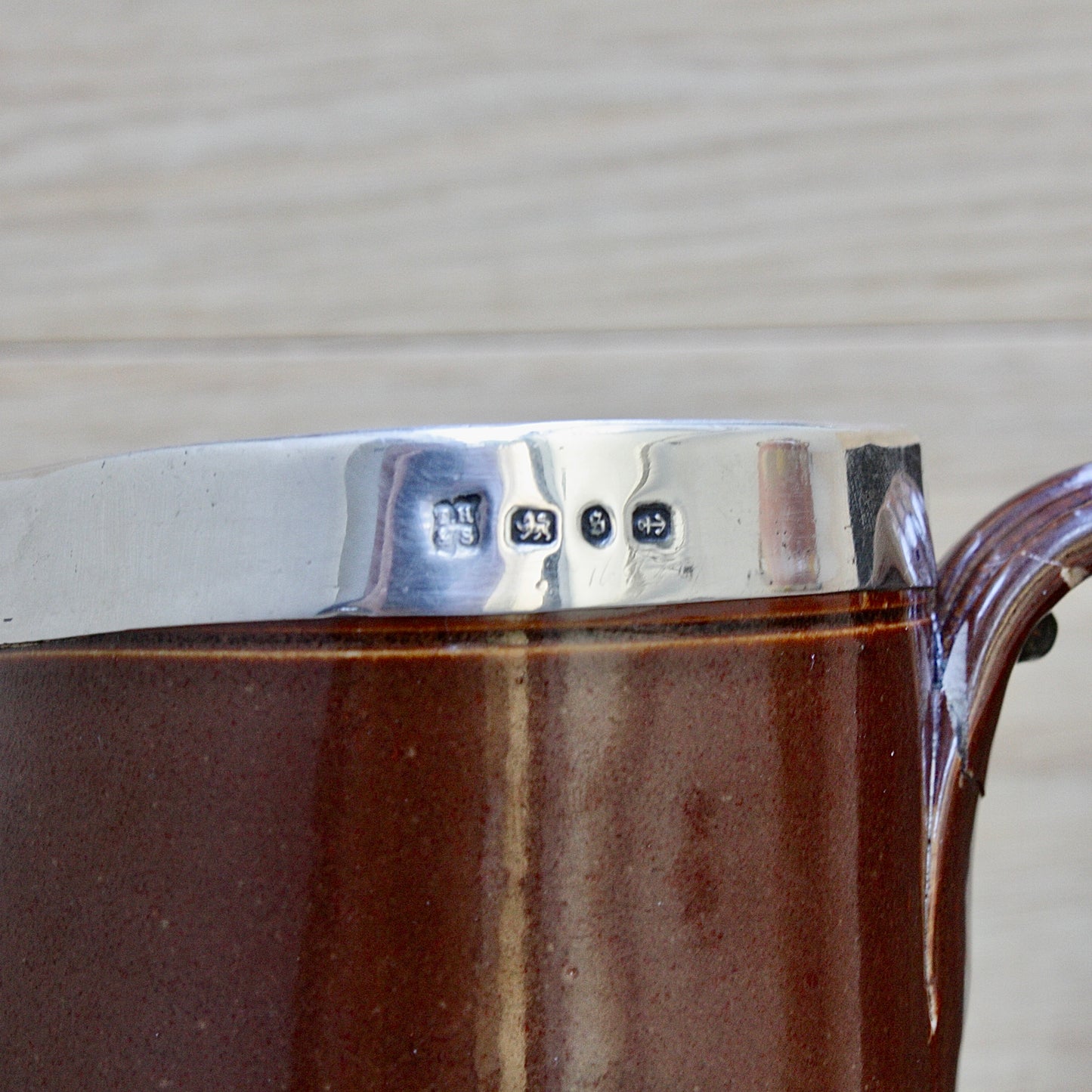 
                  
                    a splendid staple and rivet repaired doulton of lambeth "harvest" jug
                  
                