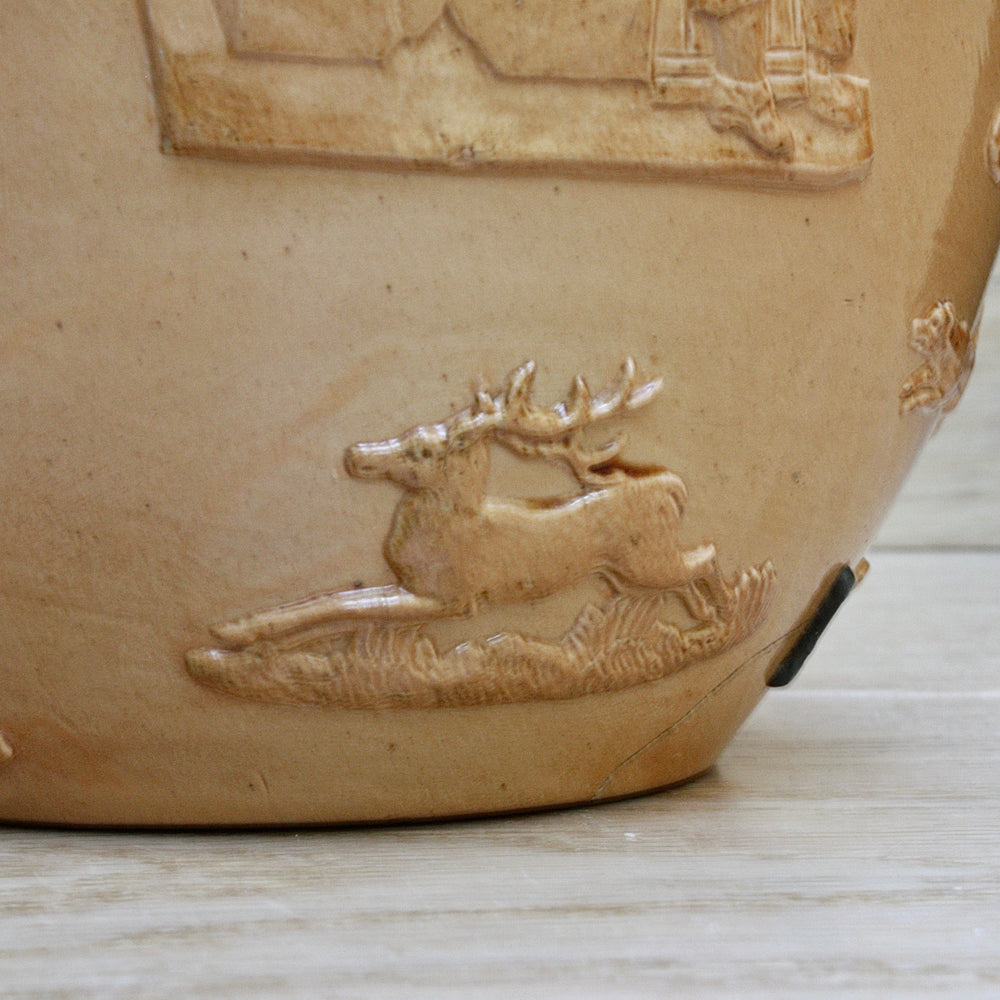 
                  
                    a splendid staple and rivet repaired doulton of lambeth "harvest" jug
                  
                