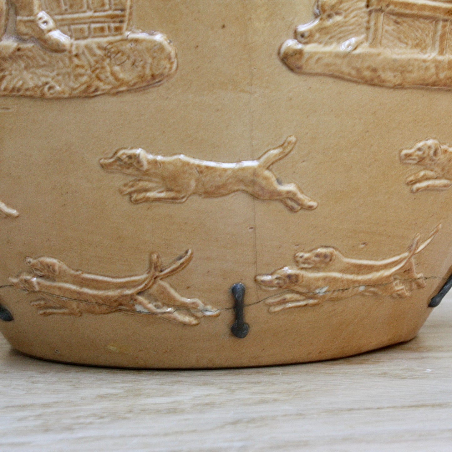 
                  
                    a splendid staple and rivet repaired doulton of lambeth "harvest" jug
                  
                