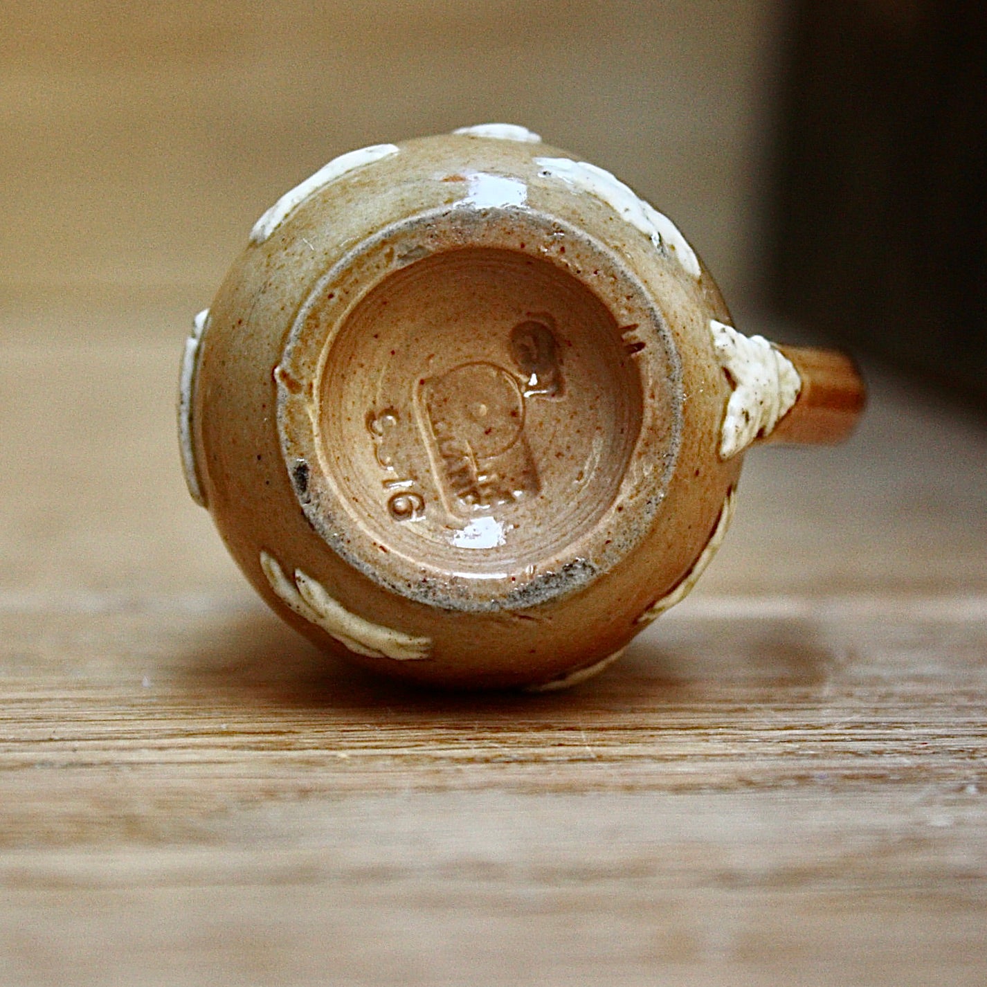 
                  
                    a miniature doulton of lambeth "harvest" jug.
                  
                