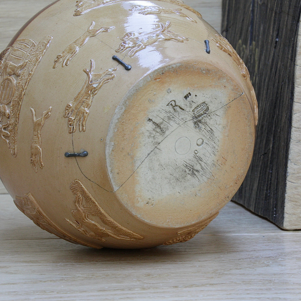 
                  
                    a splendid staple and rivet repaired doulton of lambeth "harvest" jug
                  
                