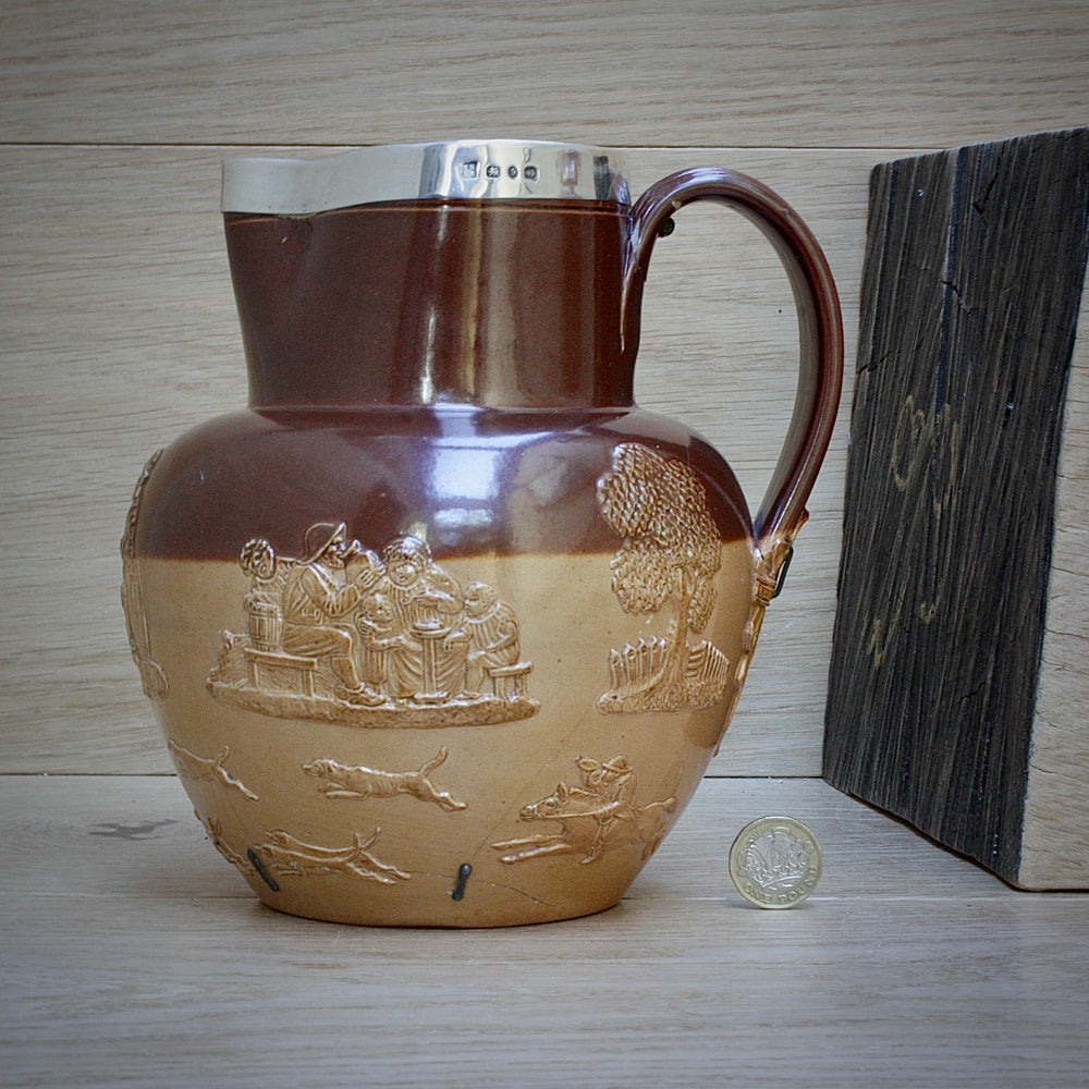 a splendid staple and rivet repaired doulton of lambeth 