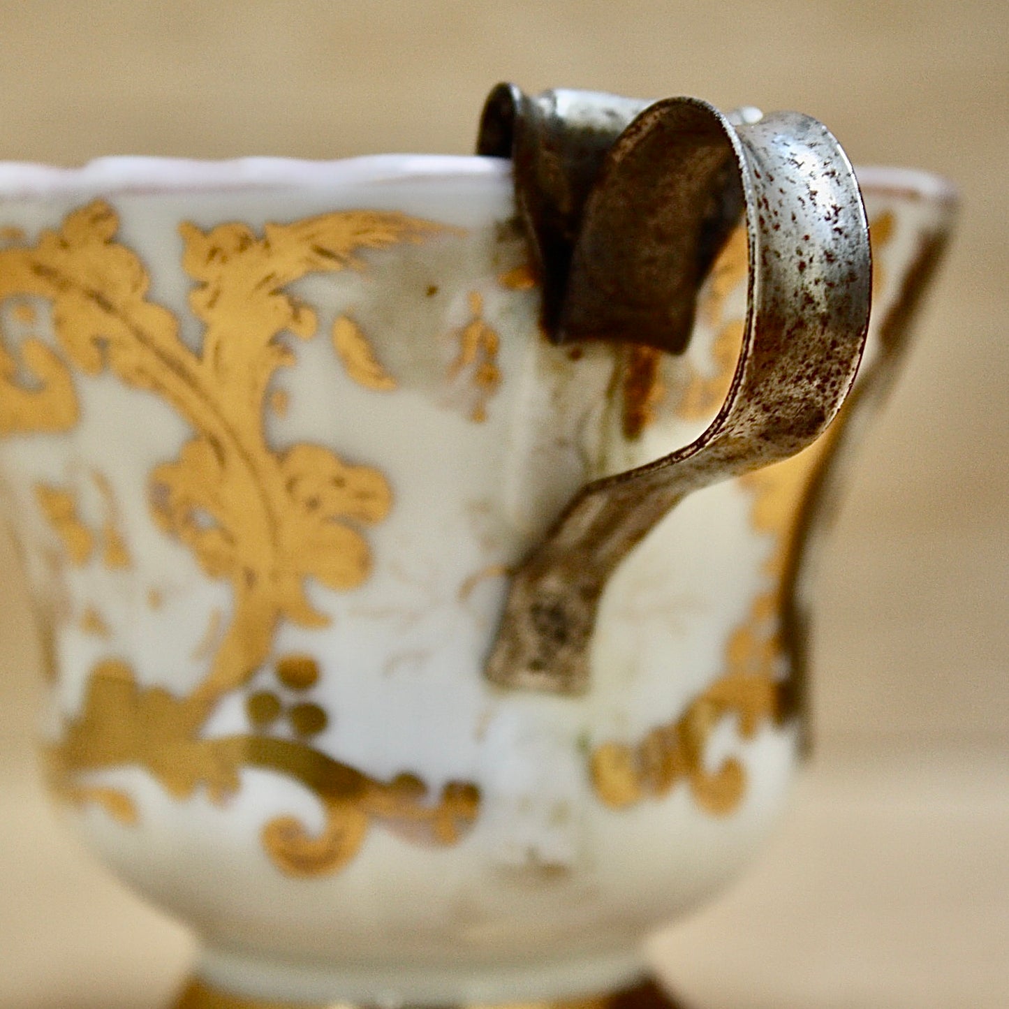 
                  
                    a cup by kpm with folk art appeal.
                  
                