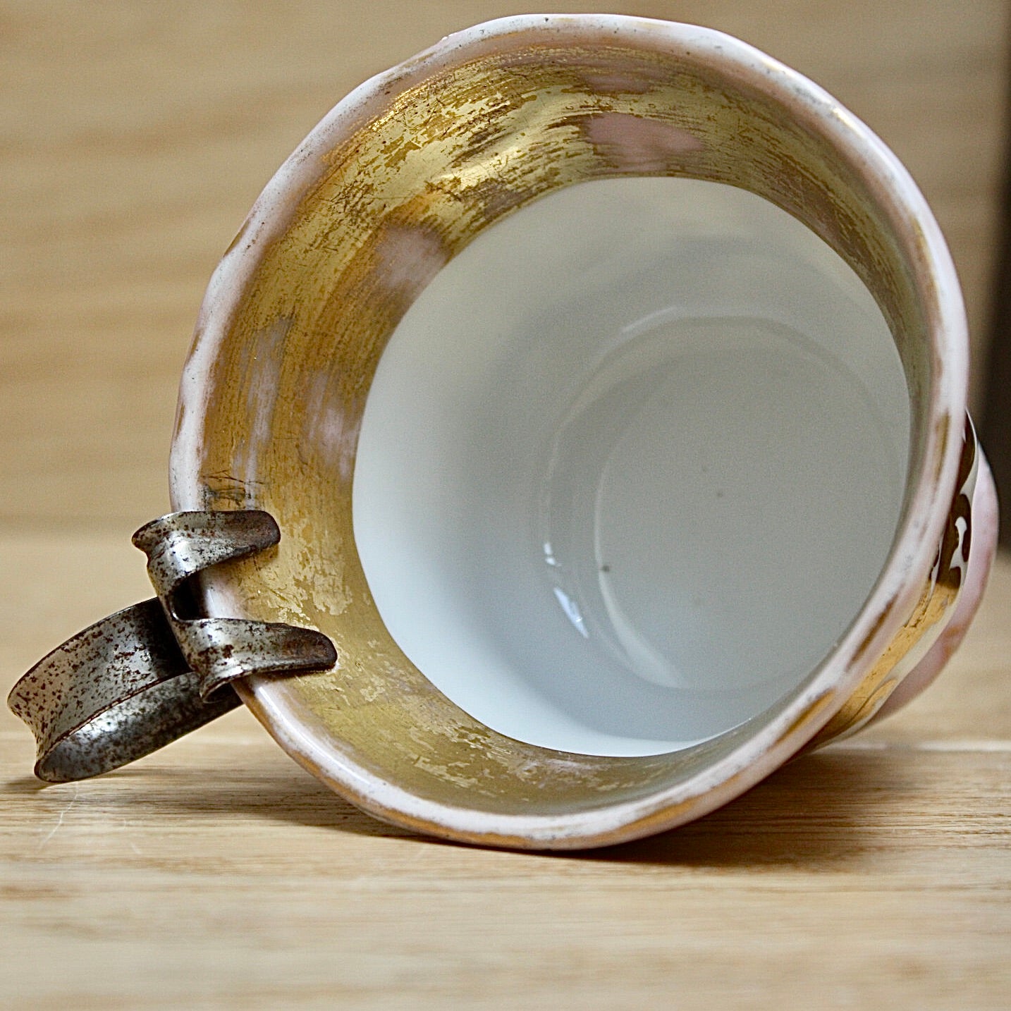 
                  
                    a cup by kpm with folk art appeal.
                  
                