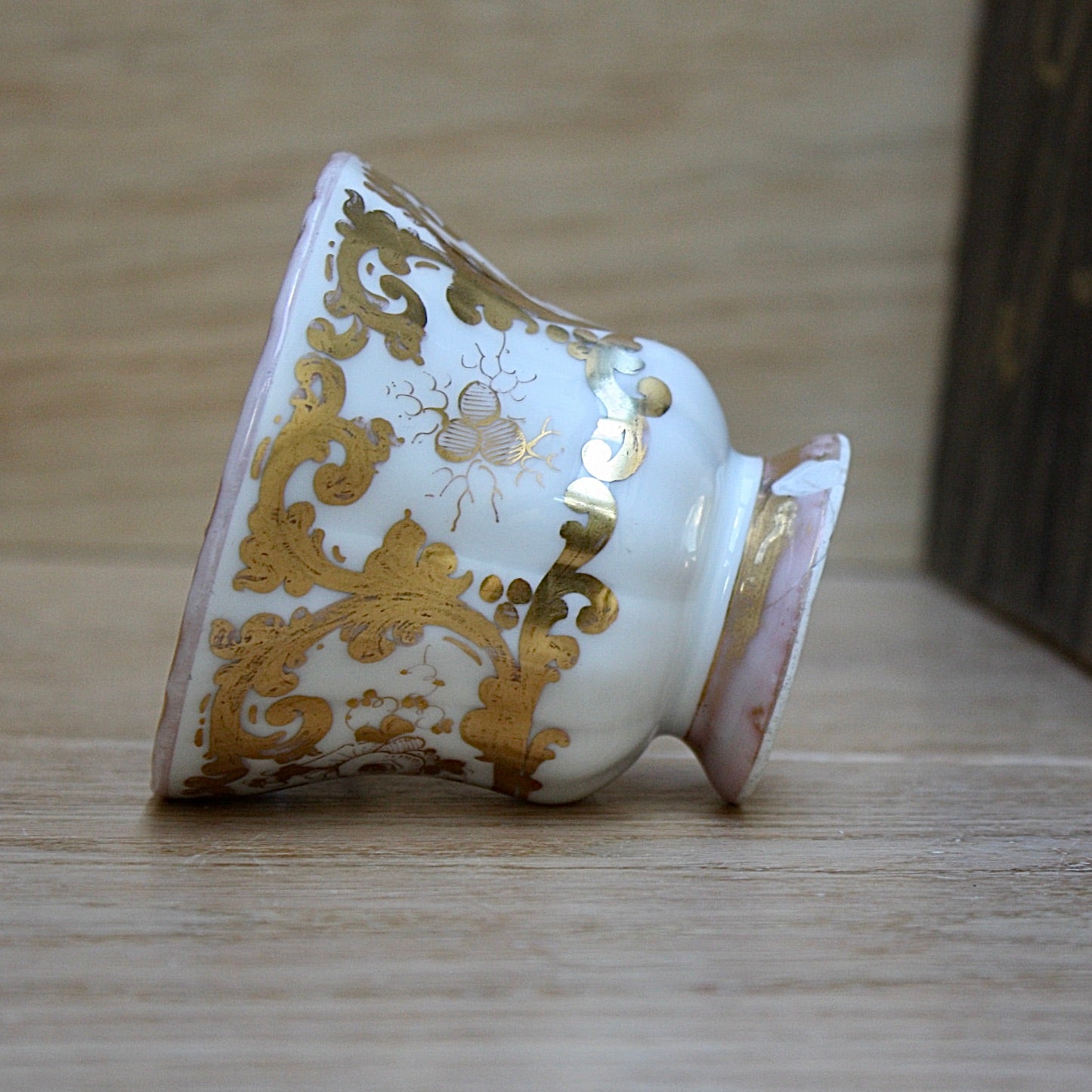 
                  
                    a cup by kpm with folk art appeal.
                  
                