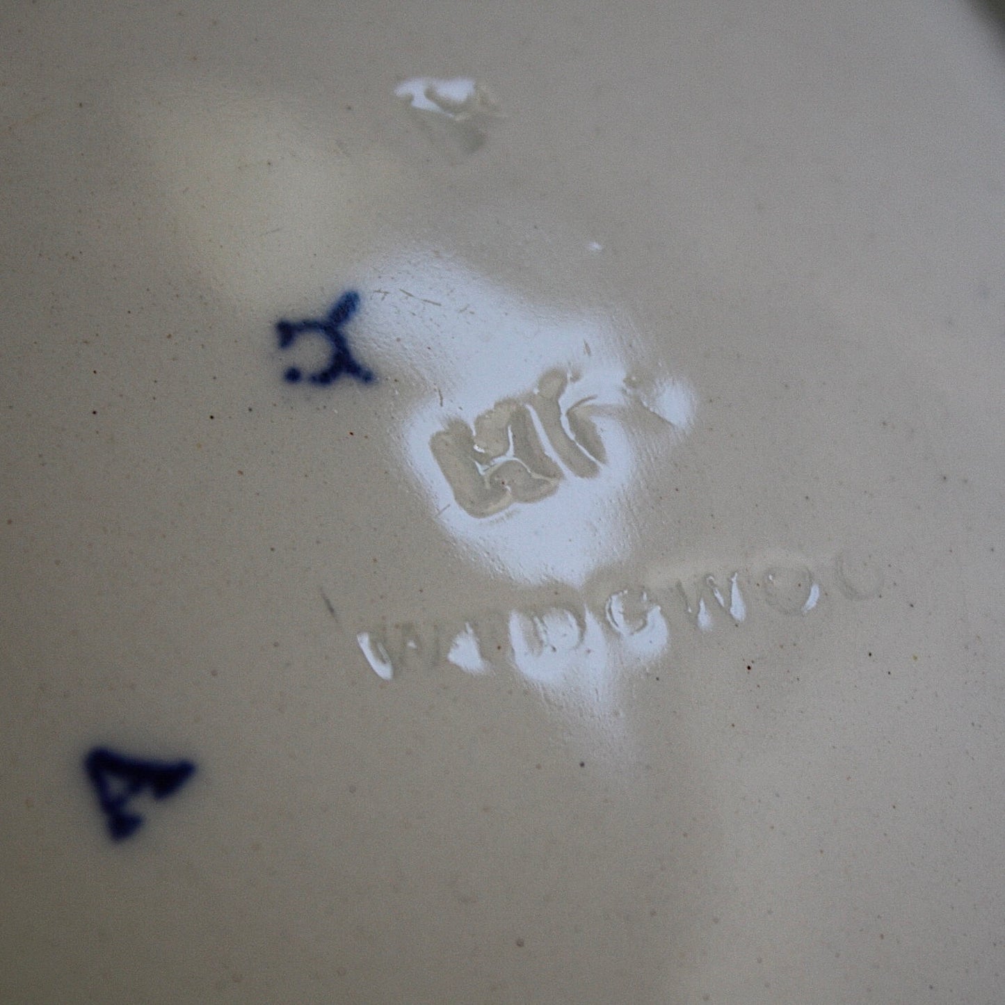 
                  
                    a staple repaired wedgwood willow pattern fruit bowl.
                  
                