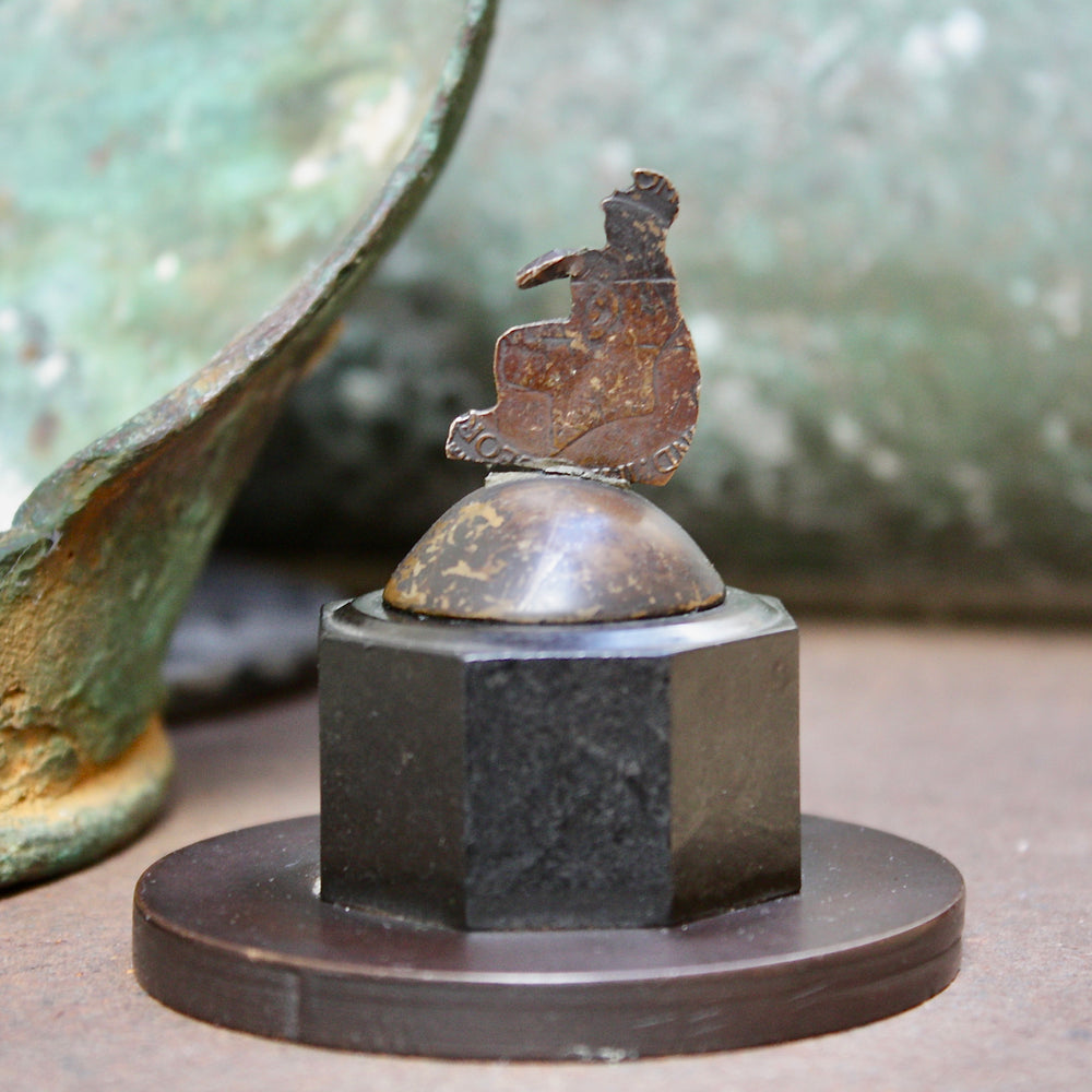 
                  
                    an unusual re purposed George v penny .
                  
                