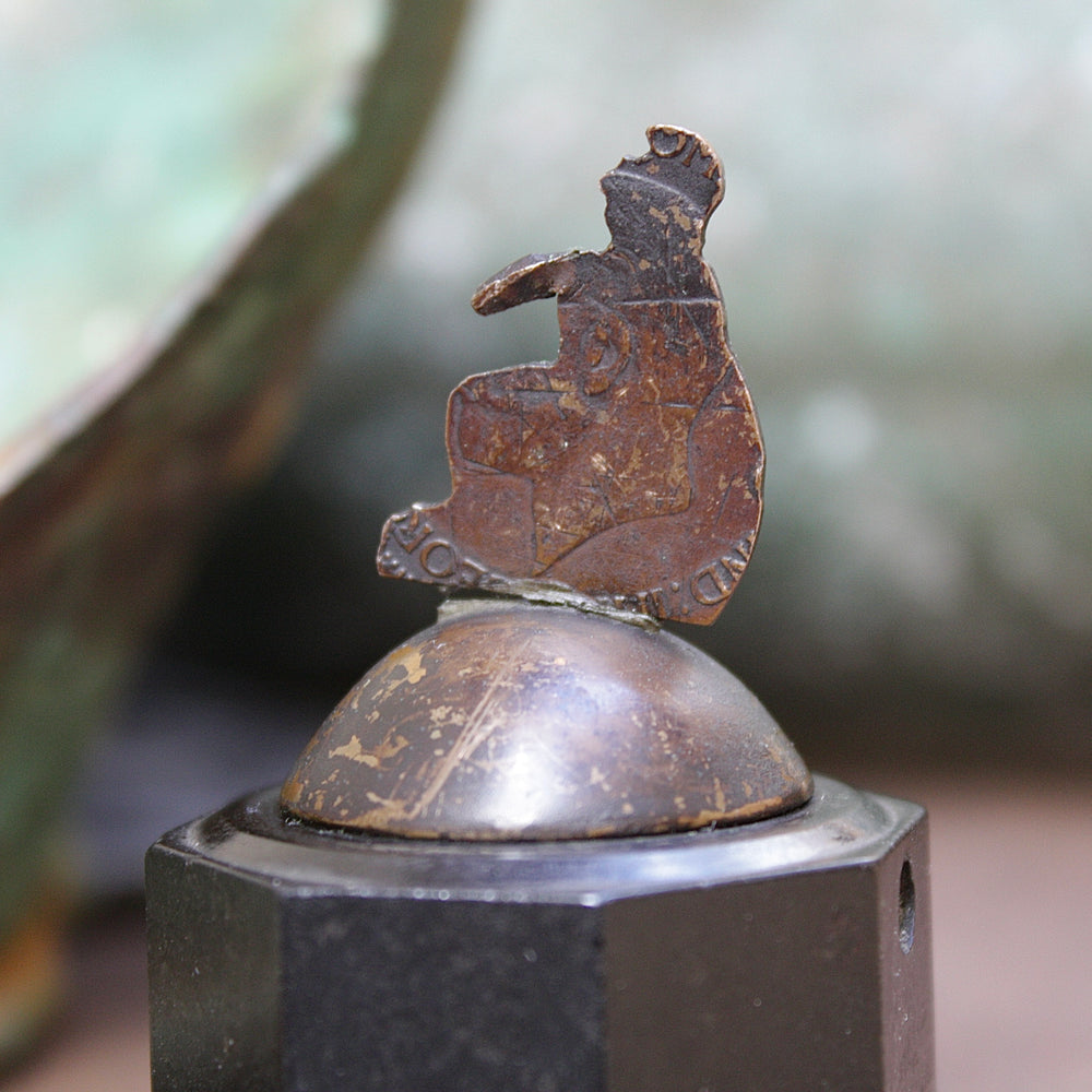 
                  
                    an unusual re purposed George v penny .
                  
                