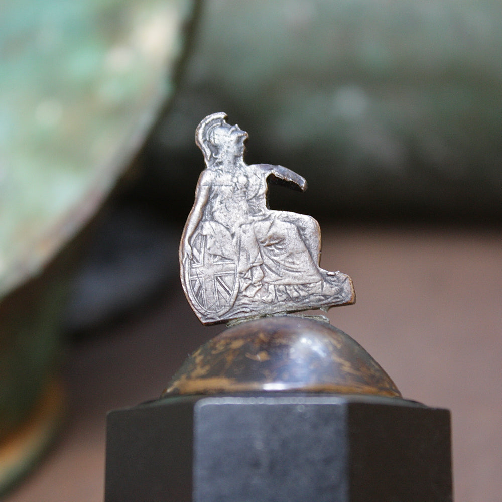 
                  
                    an unusual re purposed George v penny .
                  
                