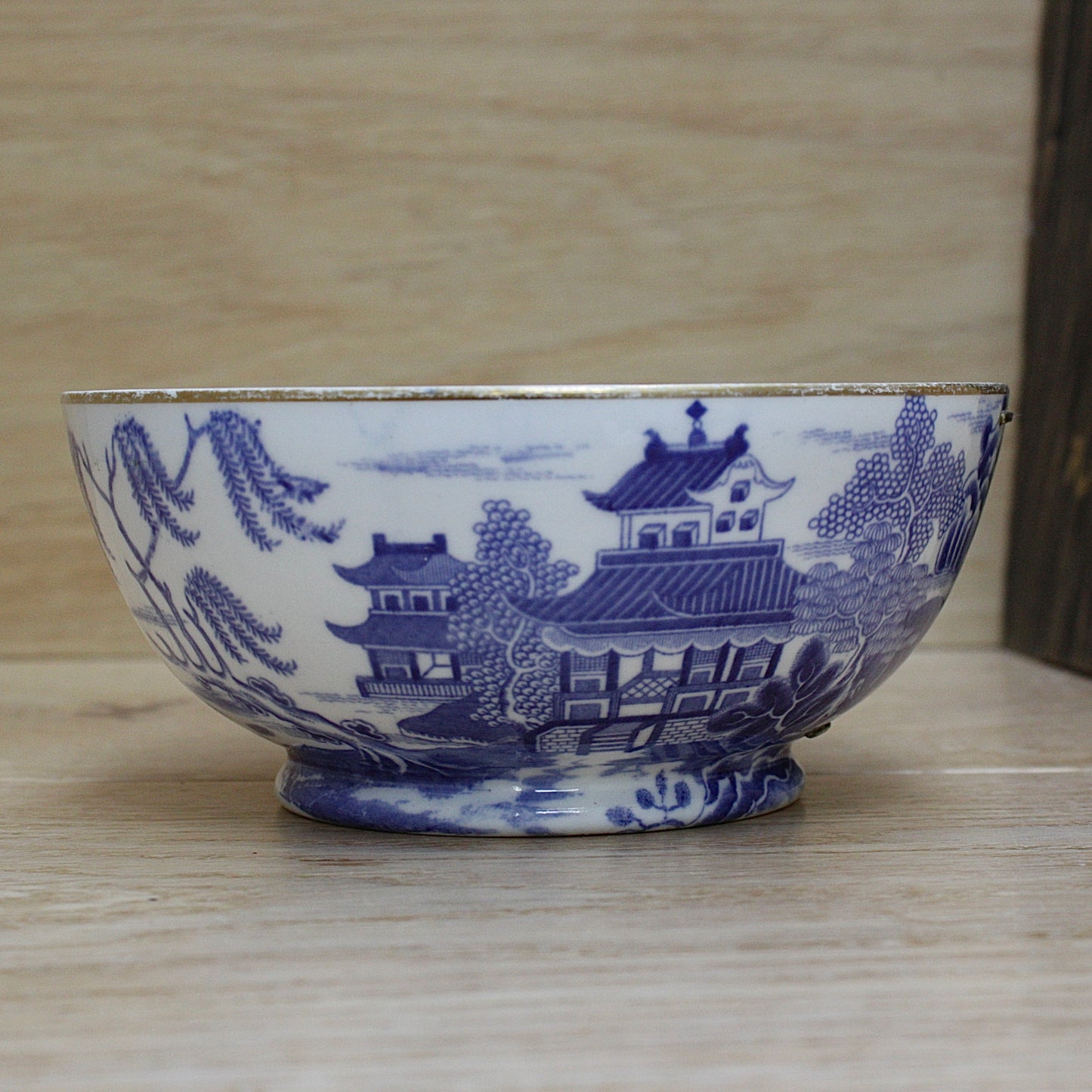 
                  
                    an early  staple repaired spode tea slop bowl.
                  
                