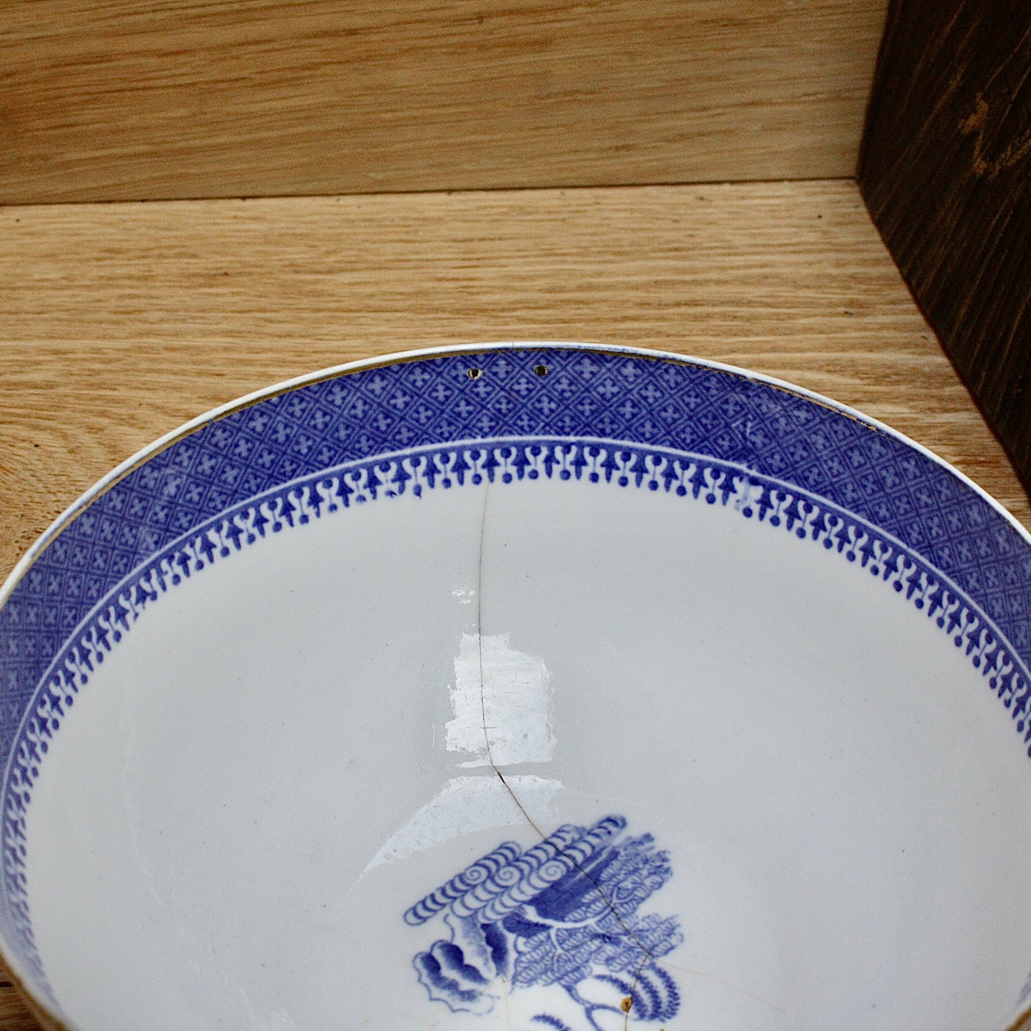 
                  
                    an early  staple repaired spode tea slop bowl.
                  
                