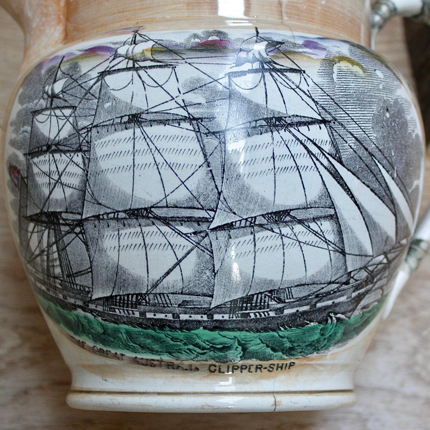 
                  
                    a  large antique Sunderland Lustre jug " the clipper ship great Australia " with tinker repaired handle.
                  
                