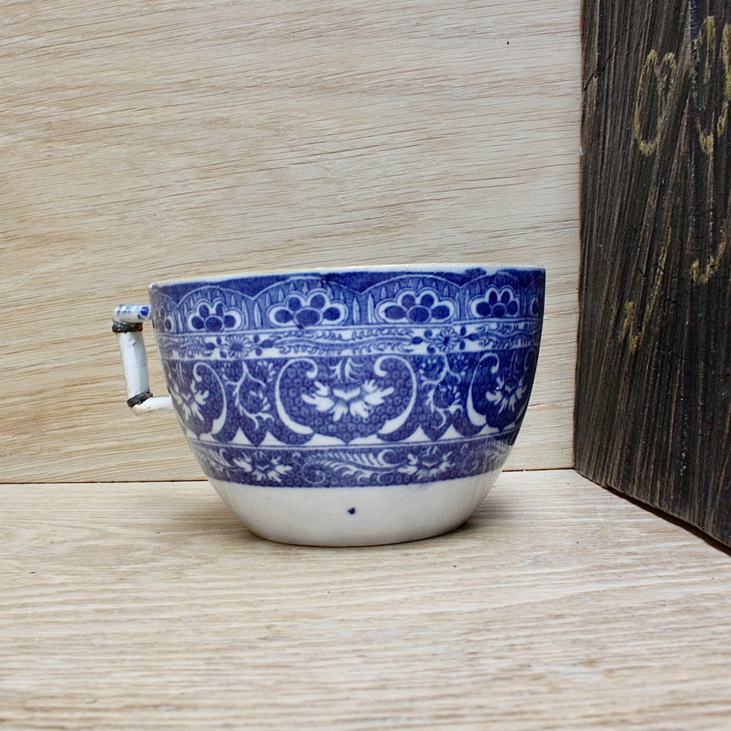 
                  
                    a charming Staffordshire pearlware cup
                  
                