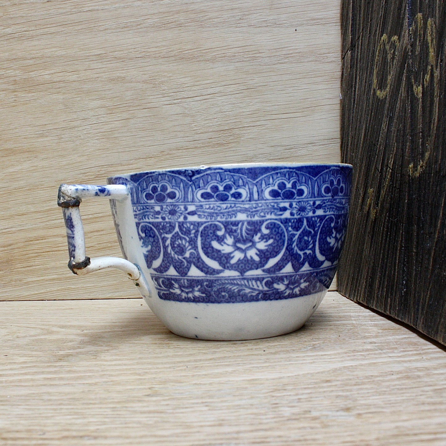 
                  
                    a charming Staffordshire pearlware cup
                  
                