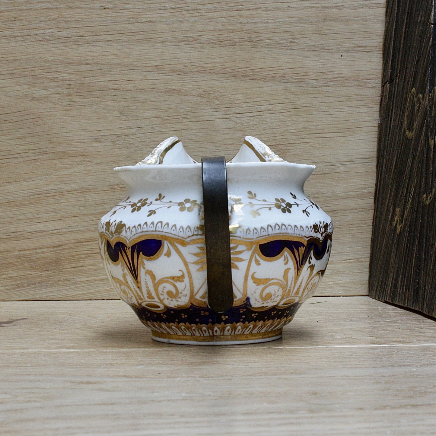 
                  
                    a bone china cream jug.
                  
                