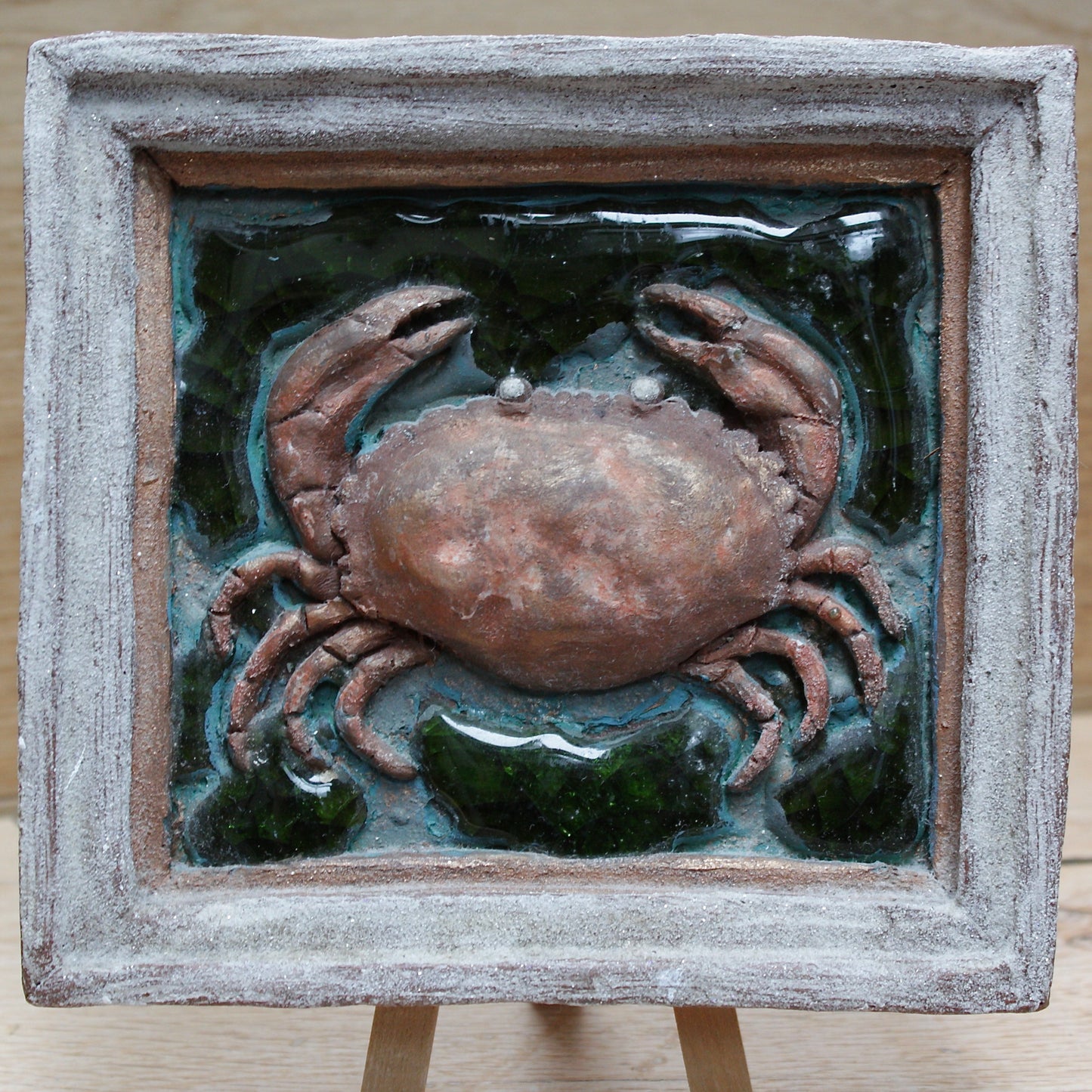 
                  
                    a brown  crab pottery portrait.
                  
                