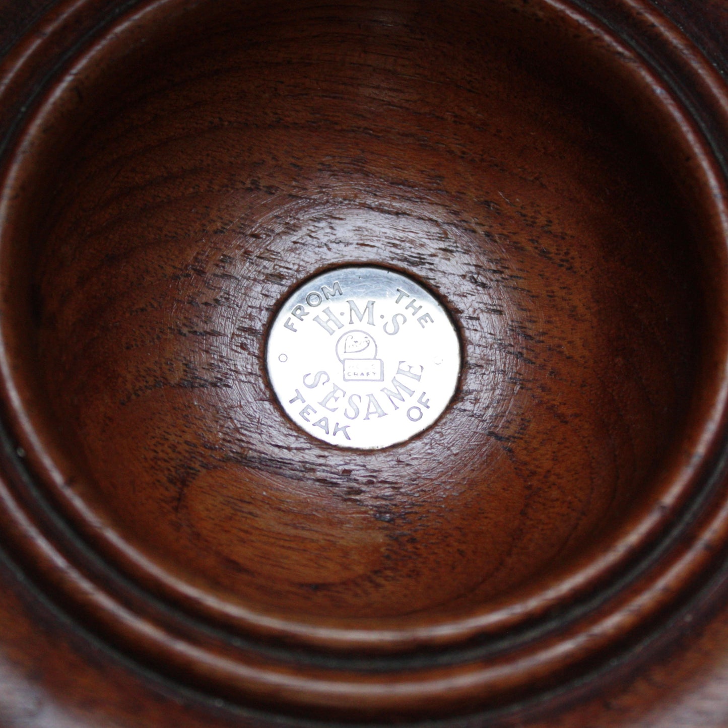 
                  
                    a bowl made from the teak of hms sesame
                  
                
