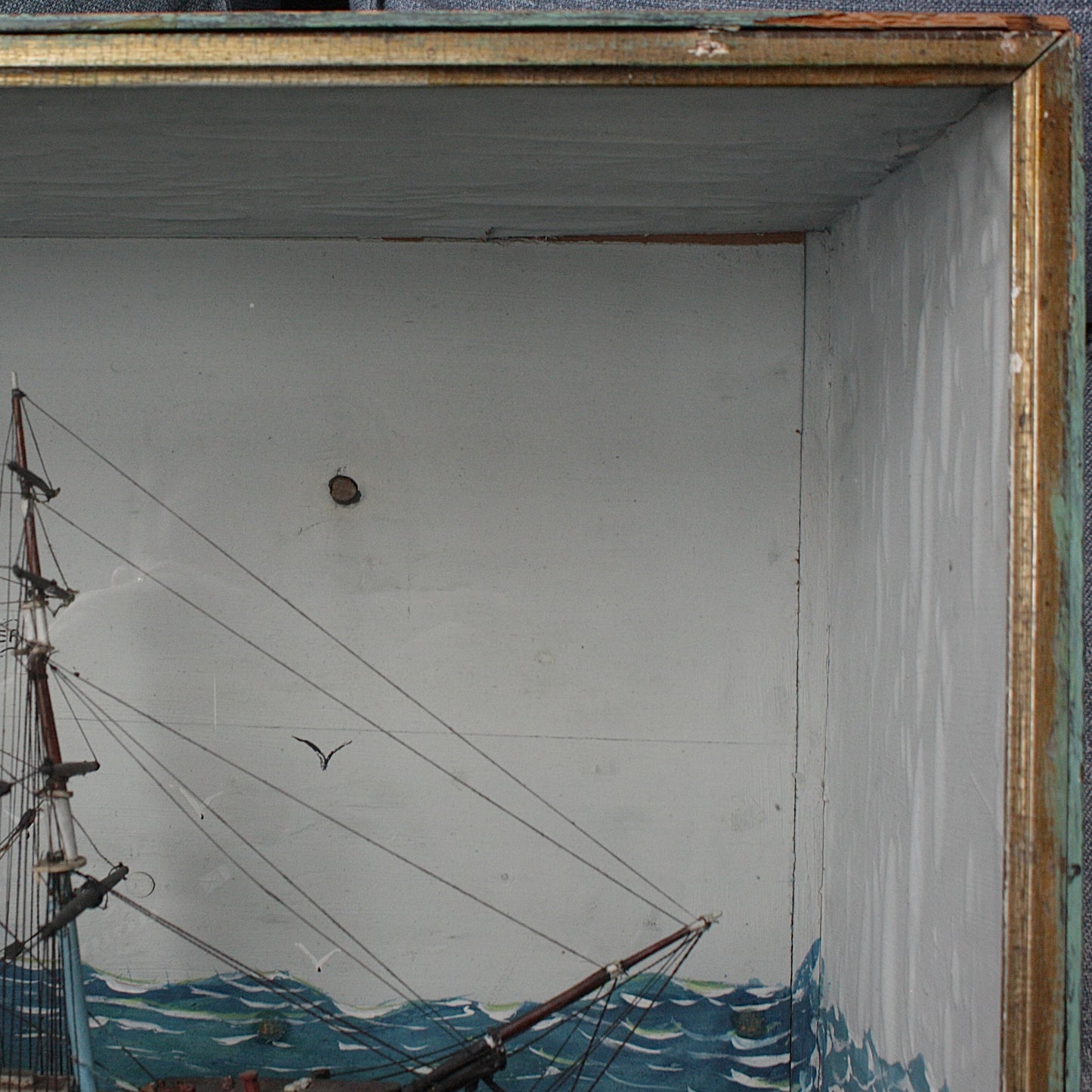 
                  
                    an antique ship in a box
                  
                