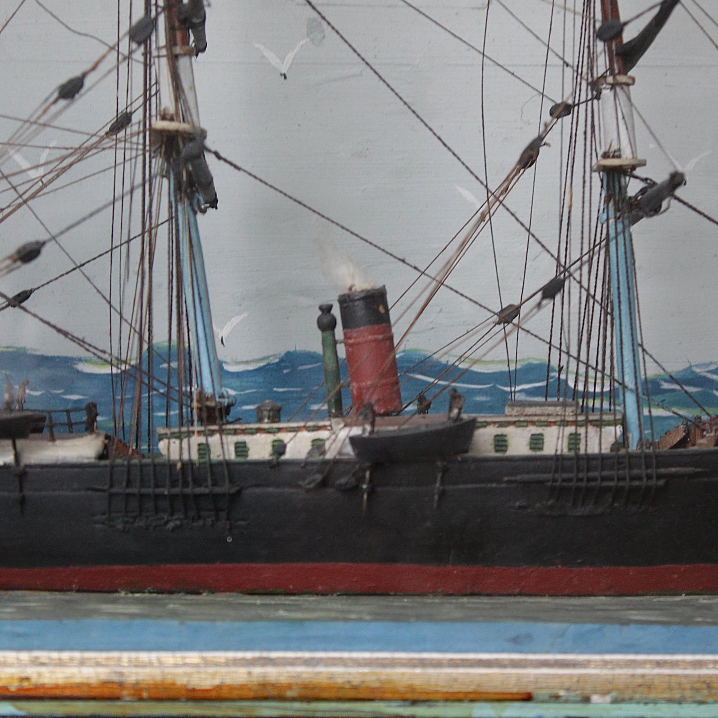 
                  
                    an antique ship in a box
                  
                