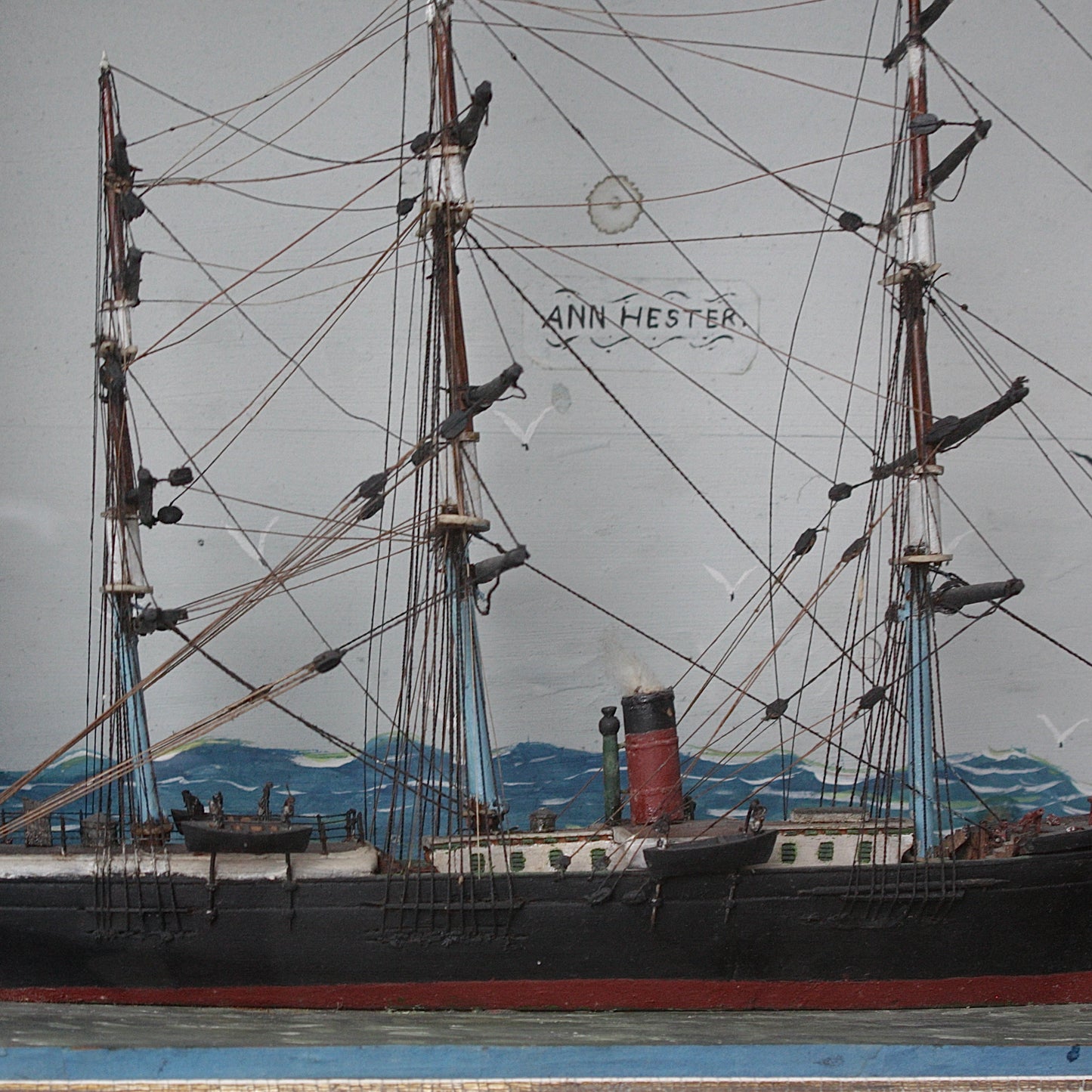 
                  
                    an antique ship in a box
                  
                