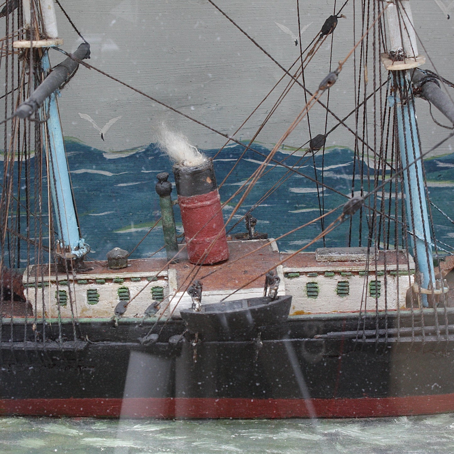 
                  
                    an antique ship in a box
                  
                